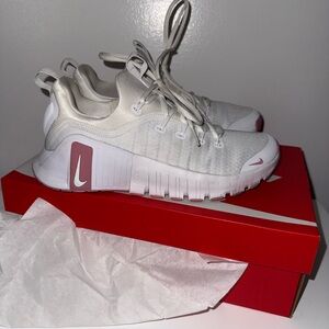 Worn once - Nike Women’s White and Pink Athletic Sneakers